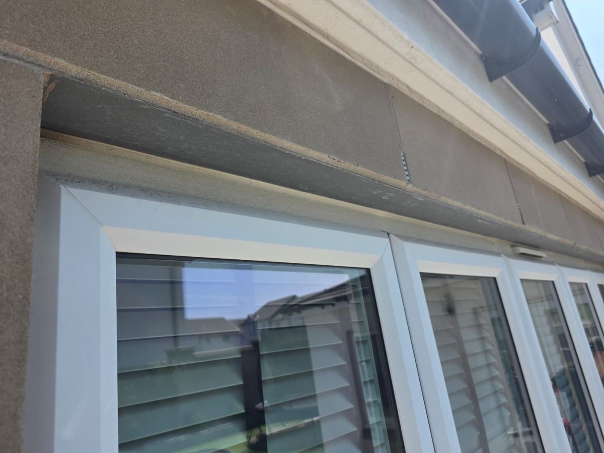 Windows and frames with weather grime before cleaning